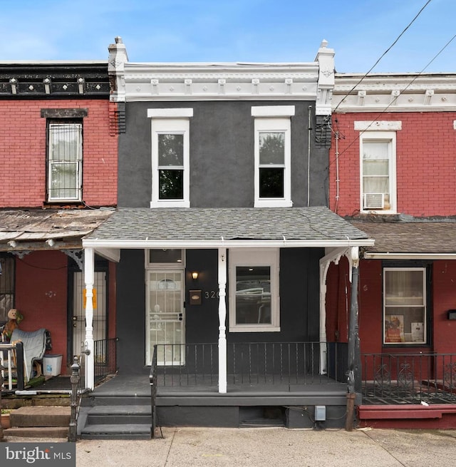 320 E Shedaker St, Philadelphia, PA 19144 - view of property with a porch and a shingled roof