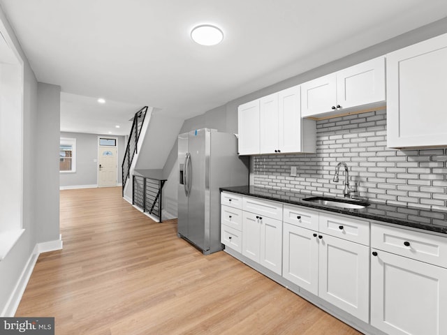 320 E Shedaker St, Philadelphia, PA 19144 - kitchen with a sink, stainless steel refrigerator with ice dispenser, decorative backsplash, white cabinets, and recessed lighting