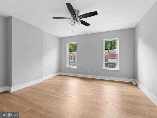 320 E Shedaker St, Philadelphia, PA 19144 - empty room with healthy amount of natural light, a ceiling fan, light wood finished floors, and baseboards