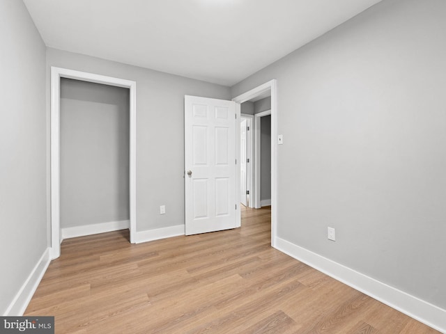320 E Shedaker St, Philadelphia, PA 19144 - unfurnished bedroom featuring light wood-type flooring, baseboards, and a closet