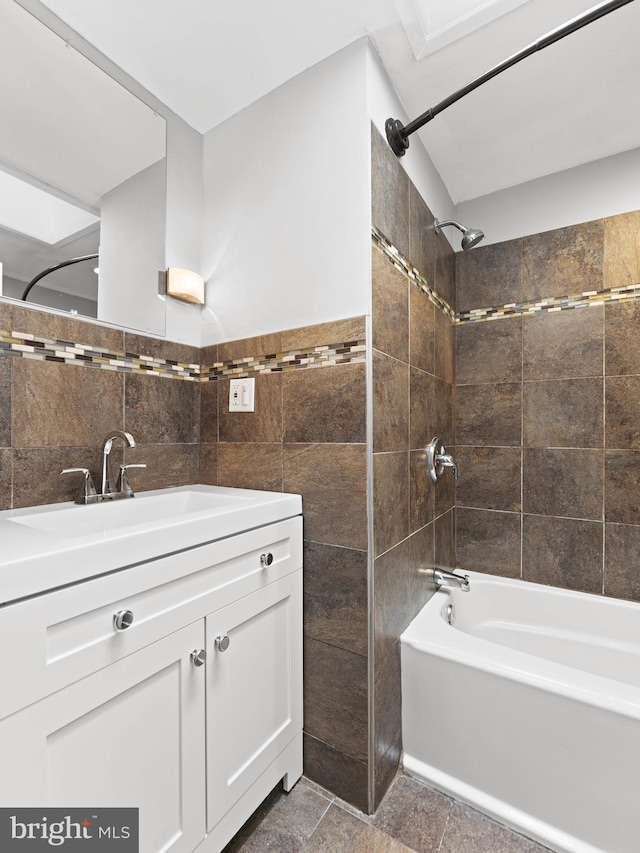320 E Shedaker St, Philadelphia, PA 19144 - full bath with tile walls, bathtub / shower combination, vanity, and wainscoting