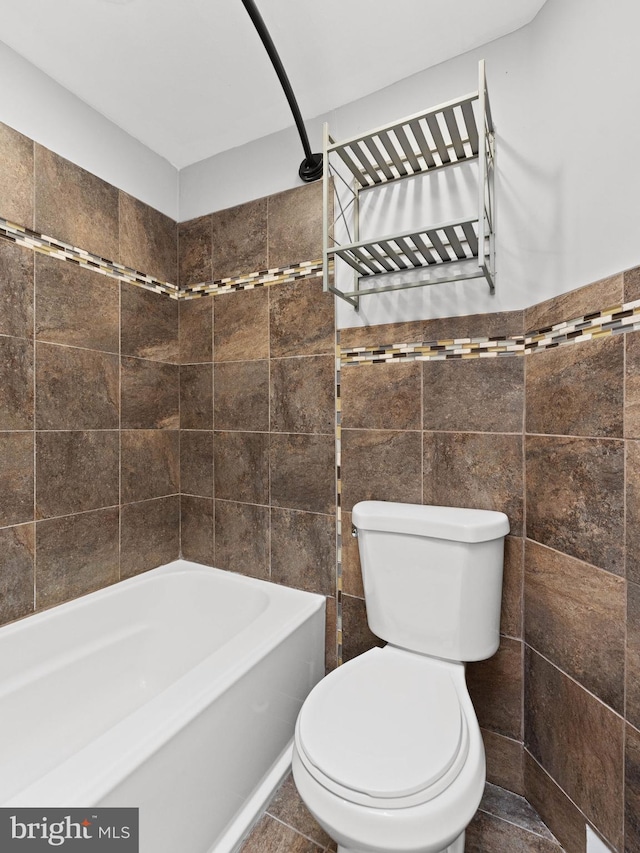 320 E Shedaker St, Philadelphia, PA 19144 - bathroom with toilet, tile walls, and bathtub / shower combination