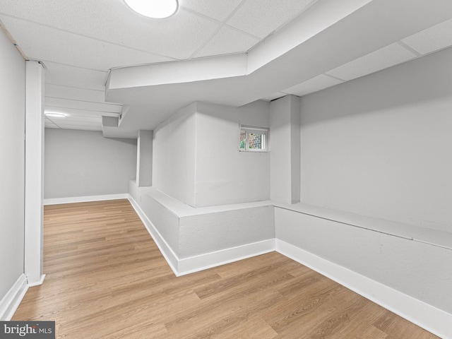 320 E Shedaker St, Philadelphia, PA 19144 - finished basement featuring a paneled ceiling, baseboards, and wood finished floors