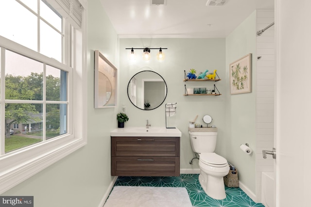 6109 Houston Ct, Alexandria, VA 22310 - bathroom featuring vanity, baseboards, toilet, shower / washtub combination, and tile patterned floors