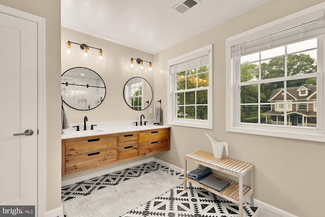 6109 Houston Ct, Alexandria, VA 22310 - full bath with double vanity, baseboards, a shower, and tile patterned floors