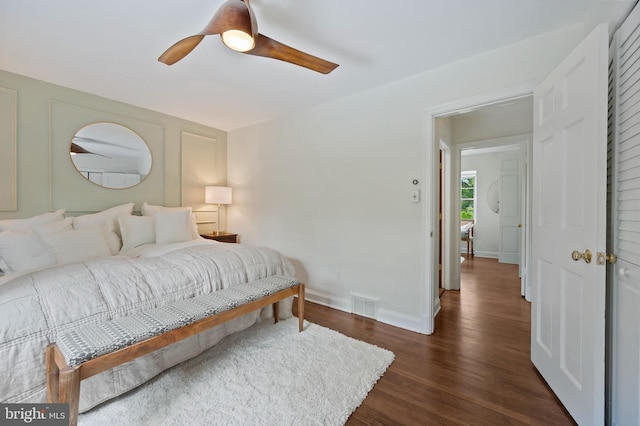 1312 Michigan Ave, Alexandria, VA 22314 - bedroom with dark wood finished floors, baseboards, and a ceiling fan