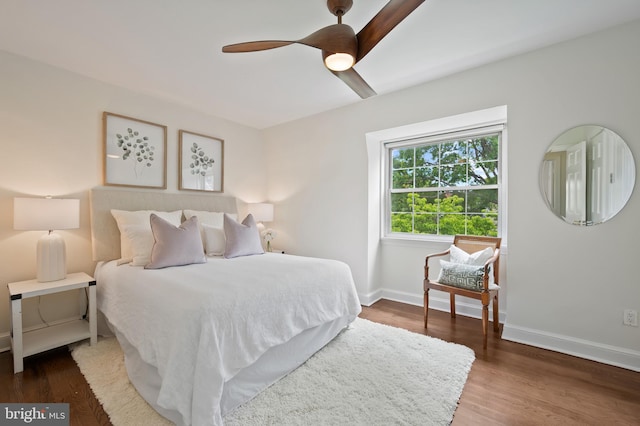 1312 Michigan Ave, Alexandria, VA 22314 - bedroom with baseboards, wood finished floors, and a ceiling fan