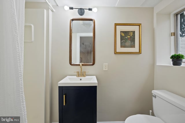 1312 Michigan Ave, Alexandria, VA 22314 - full bathroom with toilet, vanity, and a shower with curtain
