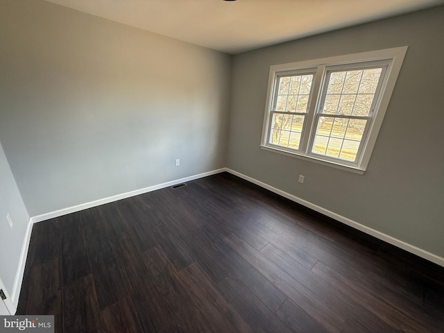 943 Columbus Rd, Burlington, NJ 08016 - empty room featuring baseboards and dark wood-style floors
