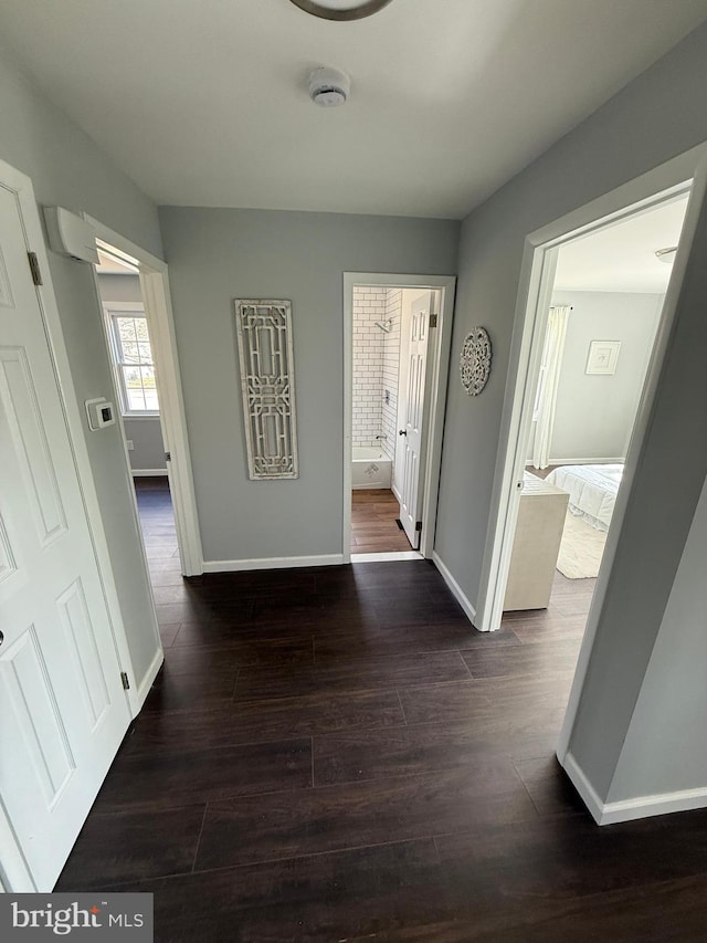 943 Columbus Rd, Burlington, NJ 08016 - hall featuring dark wood finished floors and baseboards