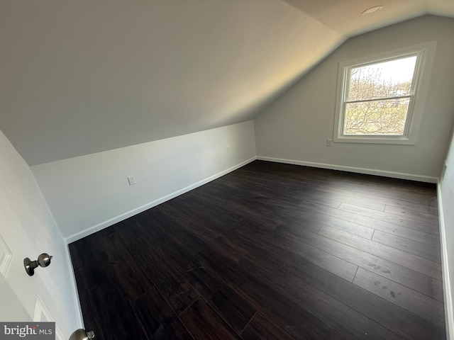 943 Columbus Rd, Burlington, NJ 08016 - bonus room featuring lofted ceiling, dark wood finished floors, and baseboards