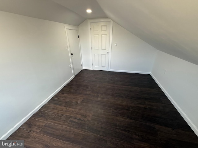 943 Columbus Rd, Burlington, NJ 08016 - additional living space featuring lofted ceiling, baseboards, and dark wood-style floors