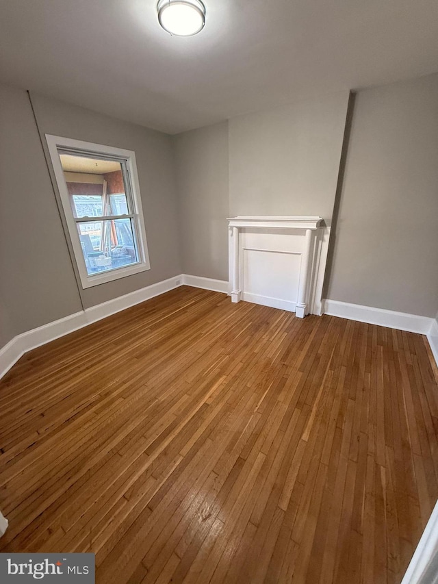943 Columbus Rd, Burlington, NJ 08016 - spare room featuring dark wood-type flooring and baseboards