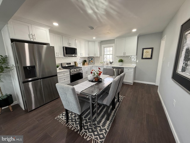 943 Columbus Rd, Burlington, NJ 08016 - kitchen featuring appliances with stainless steel finishes, white cabinetry, backsplash, light countertops, and recessed lighting