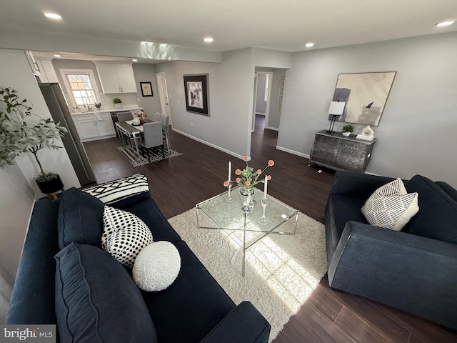 943 Columbus Rd, Burlington, NJ 08016 - living area featuring recessed lighting, dark wood-type flooring, and baseboards
