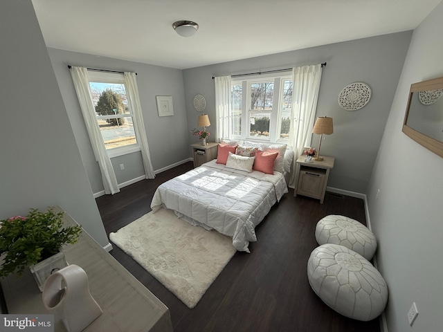 943 Columbus Rd, Burlington, NJ 08016 - bedroom with dark wood finished floors and baseboards
