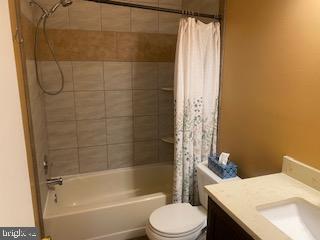 11306 Bent Creek Ter, Germantown, MD 20876 - full bathroom featuring vanity, shower / bath combination with curtain, and toilet