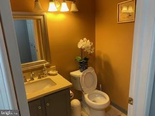 11306 Bent Creek Ter, Germantown, MD 20876 - bathroom featuring vanity, toilet, and tile patterned floors