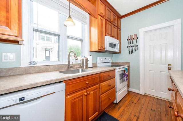 28 N Altamont Ave, Thurmont, MD 21788 - kitchen with white appliances, a sink, hardwood / wood-style floors, light countertops, and decorative light fixtures
