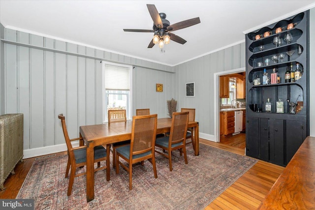 28 N Altamont Ave, Thurmont, MD 21788 - dining area featuring crown molding, wood finished floors, ceiling fan, and baseboards