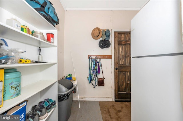 28 N Altamont Ave, Thurmont, MD 21788 - laundry room featuring wood finished floors and crown molding