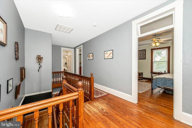 28 N Altamont Ave, Thurmont, MD 21788 - hallway featuring an upstairs landing, light wood-style floors, and baseboards