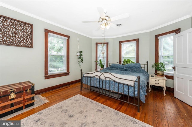 28 N Altamont Ave, Thurmont, MD 21788 - bedroom featuring hardwood / wood-style floors, baseboards, multiple windows, ornamental molding, and a ceiling fan