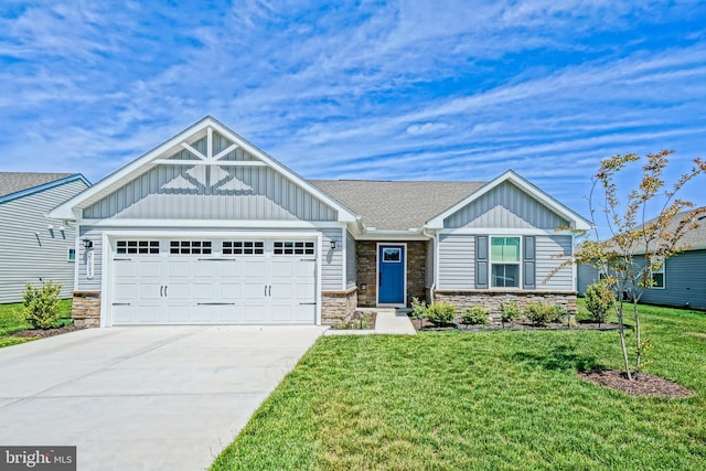 25083 Aspen Cir, Millsboro, DE 19966 - view of front facade with board and batten siding, stone siding, and a garage
