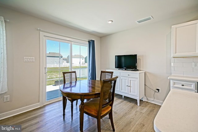 25083 Aspen Cir, Millsboro, DE 19966 - dining area with light wood finished floors and baseboards