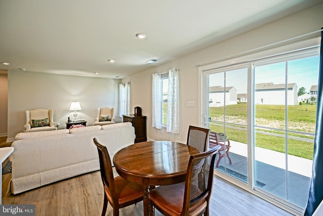 25083 Aspen Cir, Millsboro, DE 19966 - dining room with wood finished floors and recessed lighting
