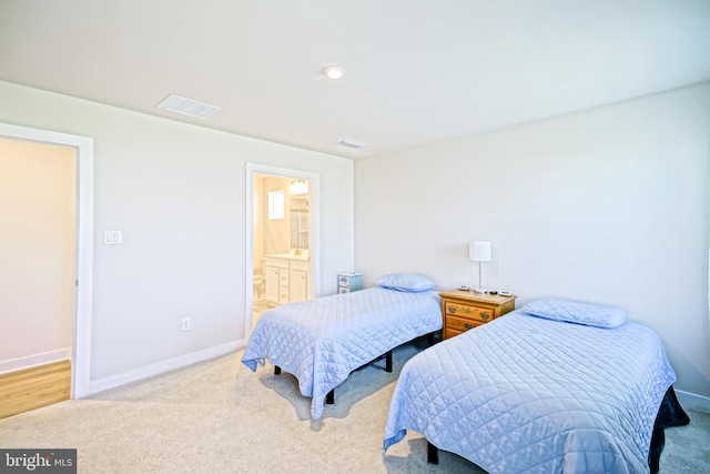 25083 Aspen Cir, Millsboro, DE 19966 - bedroom with carpet floors, baseboards, and ensuite bathroom