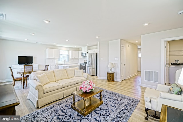 25083 Aspen Cir, Millsboro, DE 19966 - living room featuring light wood finished floors, recessed lighting, and baseboards