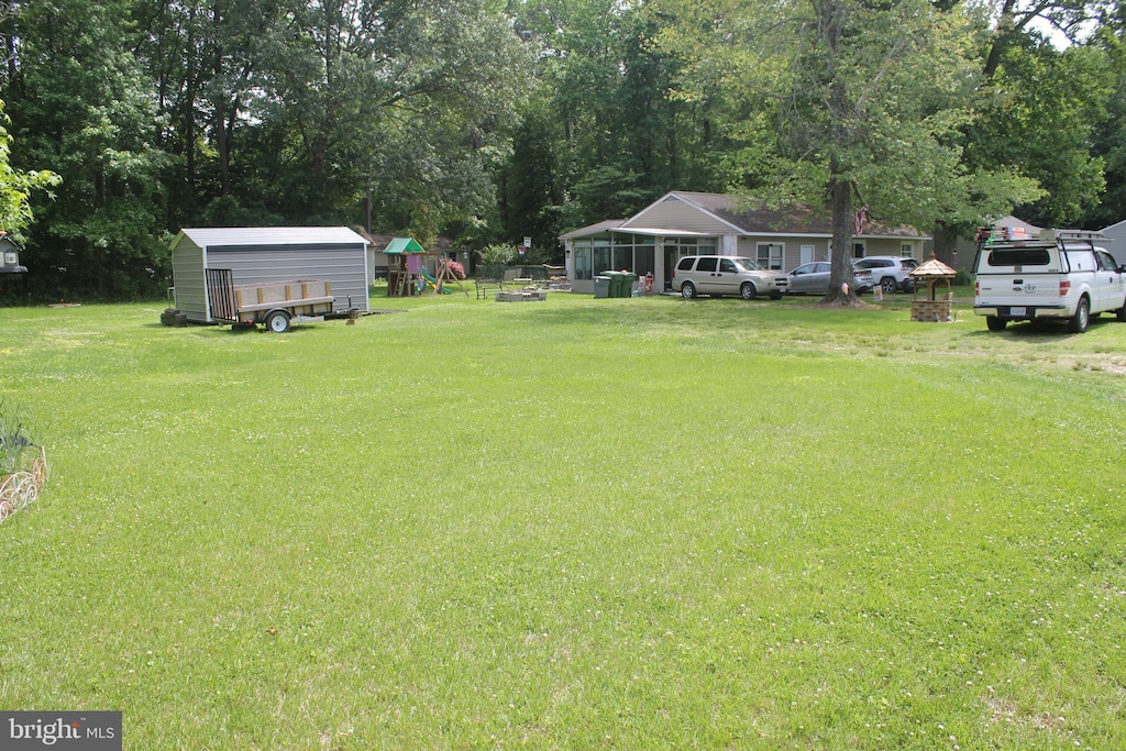 12455 Beech Trl, Gloucester, VA 23061 - view of green lawn with a playground