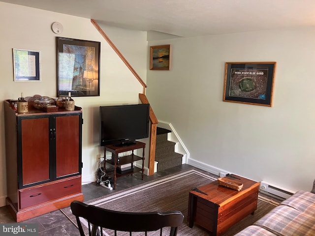 1620 Blue Course Dr, State College, PA 16801 - living room featuring a baseboard heating unit, stairway, and baseboards