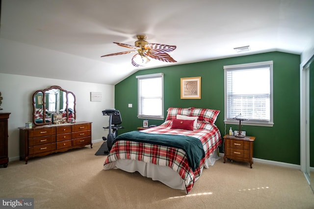 1211 Birch Ave, Baltimore, MD 21227 - carpeted bedroom with vaulted ceiling, multiple windows, baseboards, and a ceiling fan