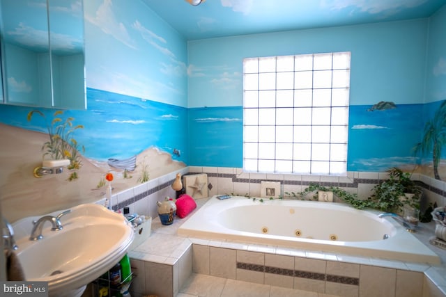 1211 Birch Ave, Baltimore, MD 21227 - bathroom with a whirlpool tub, a sink, and plenty of natural light