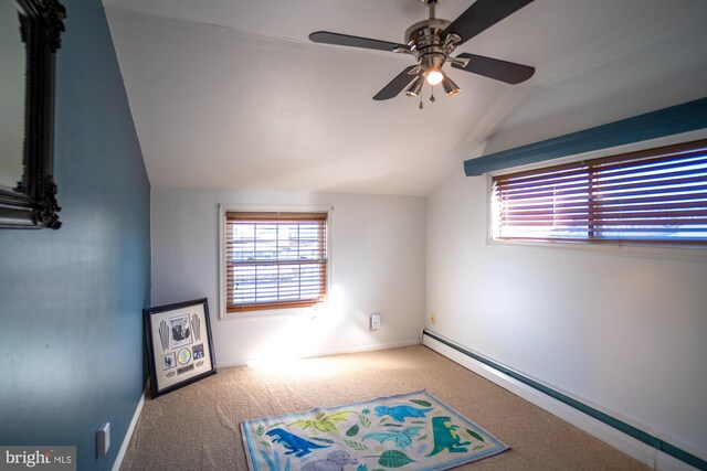 1211 Birch Ave, Baltimore, MD 21227 - carpeted spare room featuring lofted ceiling, a baseboard heating unit, ceiling fan, and baseboards