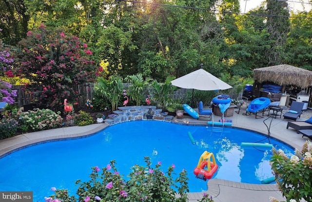 1211 Birch Ave, Baltimore, MD 21227 - view of pool featuring a fenced backyard, a patio area, and a gazebo
