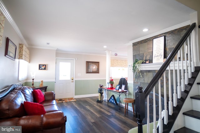 1211 Birch Ave, Baltimore, MD 21227 - living area featuring wood finished floors, ornamental molding, stairs, recessed lighting, and decorative columns