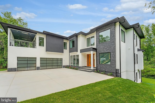1434 Waggaman Cir, Mclean, VA 22101 - contemporary home featuring stone siding, stucco siding, a garage, and driveway