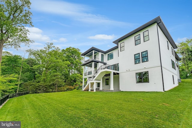 1434 Waggaman Cir, Mclean, VA 22101 - back of property featuring stucco siding and a balcony