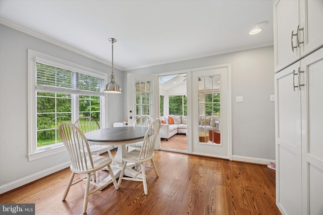 237 Trianon Ln, Villanova, PA 19085 - dining area with baseboards, plenty of natural light, light wood-style floors, and crown molding