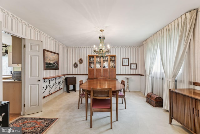 5 S Syracuse Dr, Cherry Hill, NJ 08034 - dining area featuring wallpapered walls, a chandelier, and light colored carpet