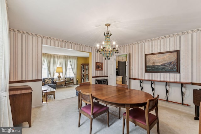 5 S Syracuse Dr, Cherry Hill, NJ 08034 - dining space featuring wallpapered walls, a chandelier, light colored carpet, and baseboards