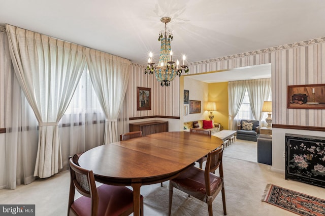 5 S Syracuse Dr, Cherry Hill, NJ 08034 - dining space featuring wallpapered walls, light carpet, and a chandelier