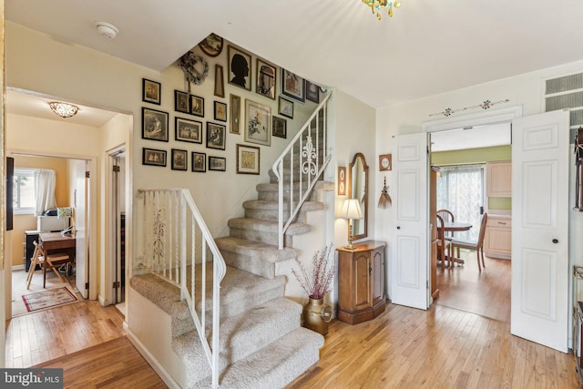 5 S Syracuse Dr, Cherry Hill, NJ 08034 - stairway featuring hardwood / wood-style floors and plenty of natural light