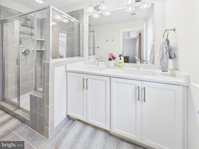 4737 Earl Flanagan Way, Alexandria, VA 22309 - bathroom with a stall shower, double vanity, and tile patterned floors