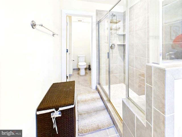 4737 Earl Flanagan Way, Alexandria, VA 22309 - bathroom with a shower stall, tile patterned flooring, and toilet