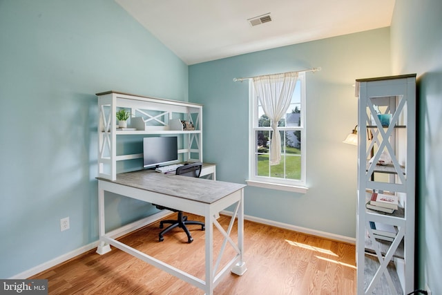 8859 Howland Pl, Bristow, VA 20136 - office area with wood finished floors and vaulted ceiling