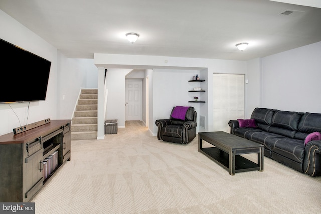 8859 Howland Pl, Bristow, VA 20136 - living room with light colored carpet and stairway